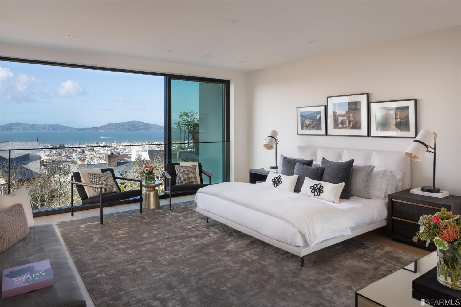 Master bedroom with plate glass window view of SF Bay
