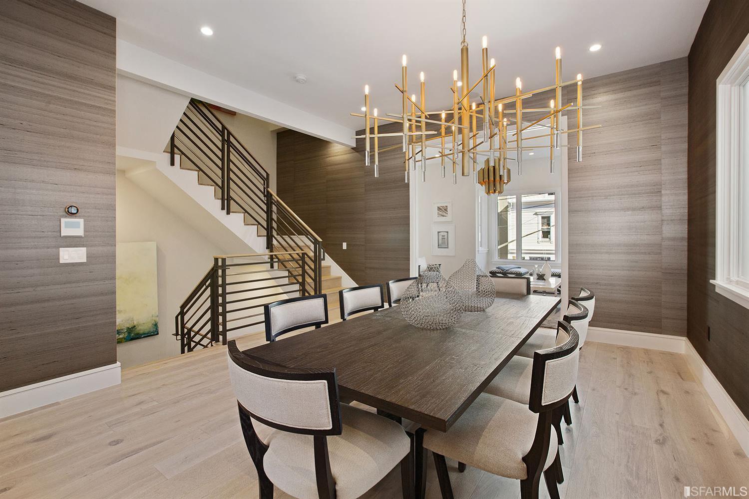 Dining room with chandelier downstairs residence SF image #2